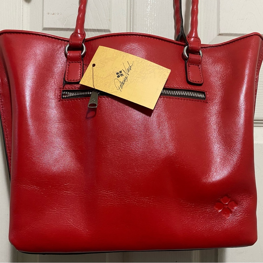 Patricia Nash Tote with beautiful detail and dust bag.